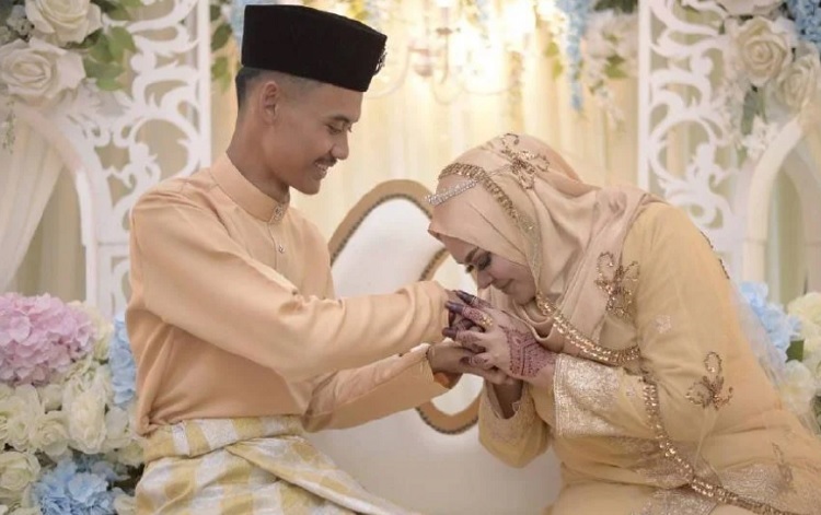 Vợ chồng Muhammad trong ngày cưới. Ảnh: Muhammad Danial Ahmad Ali